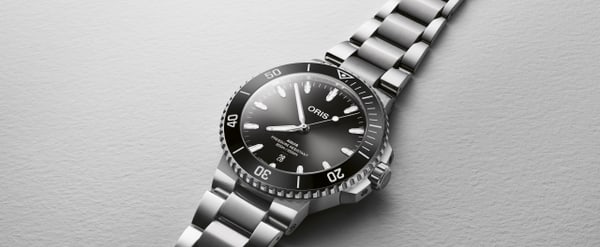 Aquis Date - 01 733 7789 4154-07 8 23 04PEB | Oris